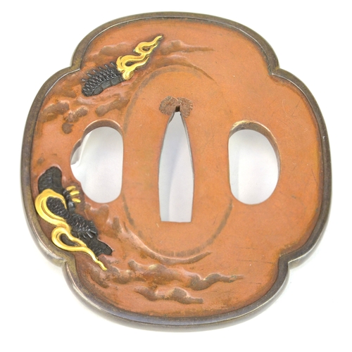 7020 - HITOTSUYANAGI TOMOYOSHI- A bronze shakudo tsuba guard depicting a dragon appearing from the guard in... 