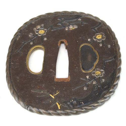 7021 - Five iron tsuba, small oval with bamboo stems in gold, oval with lily flowers, kakumarugata with che... 