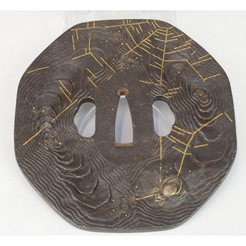 7028 - An iron octagonal tsuba decorated with steel spiders and gold cobwebs, unsigned

 Provenance
 Henry ... 
