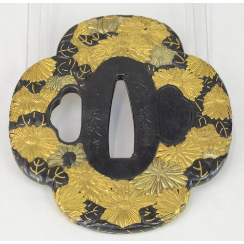 7030 - TOMOAKI OF NAGATO PROVINCE- A shakudo mokko gata tsuba decorated profusely in gold iroe takazogan wi... 