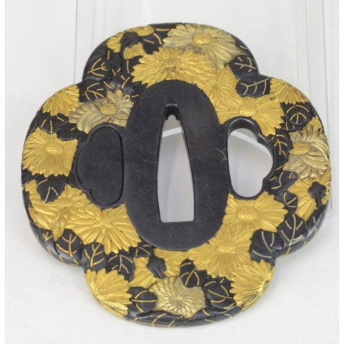 7030 - TOMOAKI OF NAGATO PROVINCE- A shakudo mokko gata tsuba decorated profusely in gold iroe takazogan wi... 