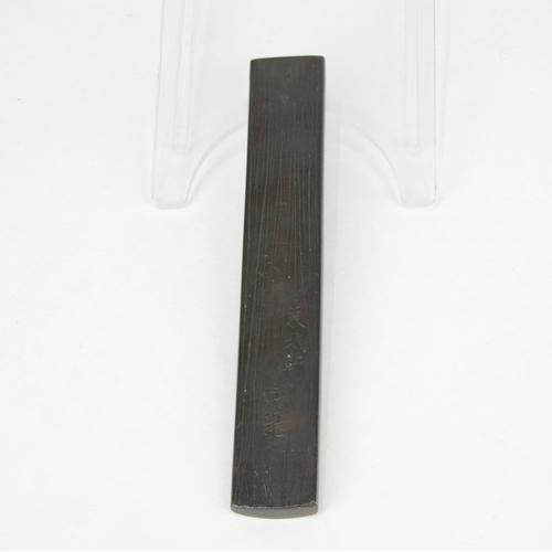 7052 - A mixed metal kozuka decorated with cranes in silver amongst gold bamboo stems in takazogan, signed
... 