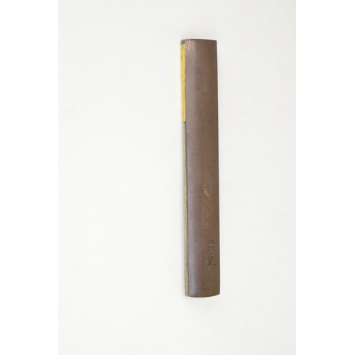 7054 - A mixed metal kozuka depicting a fish swimming amongst rocks, signed with two characters

 Provenanc... 