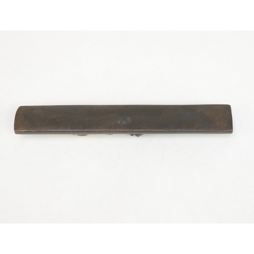 7058 - A metal kozuka decorated in gold and shakudo with a shishi and dragon in takazogan, unsigned

 Prove... 