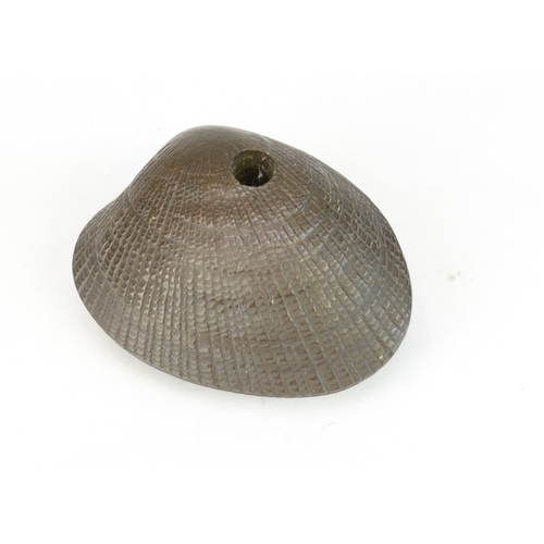 7063 - Three Japanese metal items to include a solid metal aubergine netsuke signed Tsunemitsu  together wi... 
