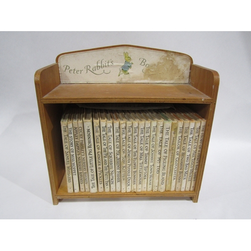 A collection of twenty-three Beatrix Potter Peter Rabbit books
