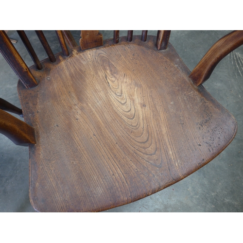 2004 - A pair of early 19th Century ash and elm wheelback armchairs