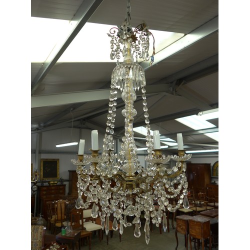 2011 - A French gilt brass and glass chandelier