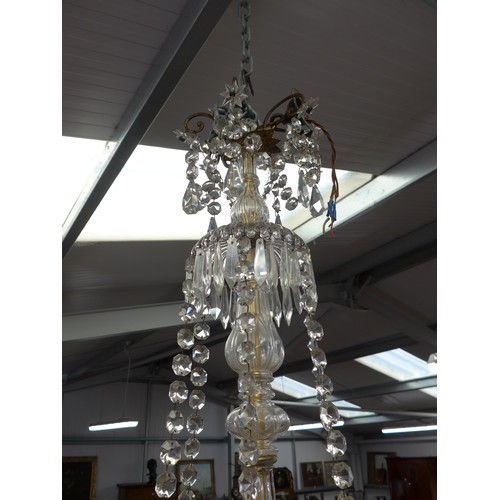 2011 - A French gilt brass and glass chandelier
