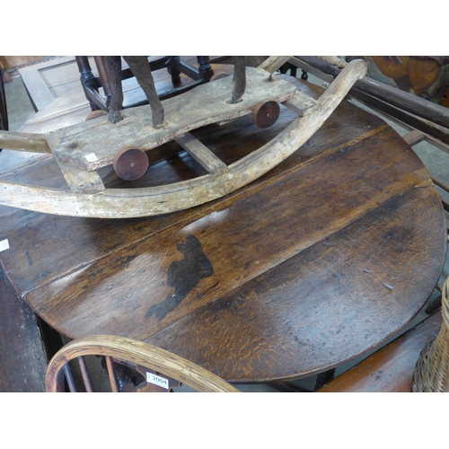 2002 - A 17th Century oak gateleg dining table with end drawer on barley twist legs, 125x160cm