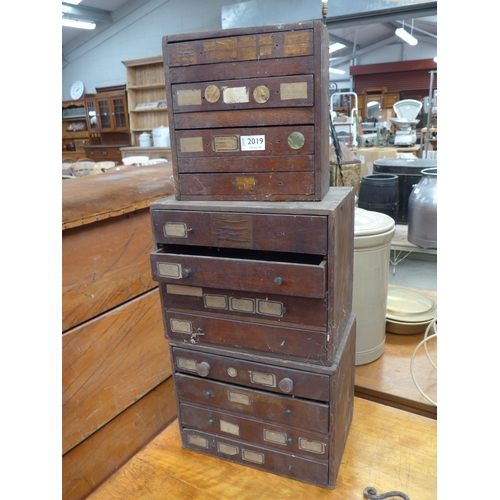 2019 - Three small banks of mahogany drawers