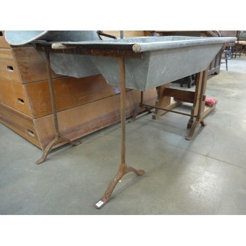2028 - A pair of iron trestles