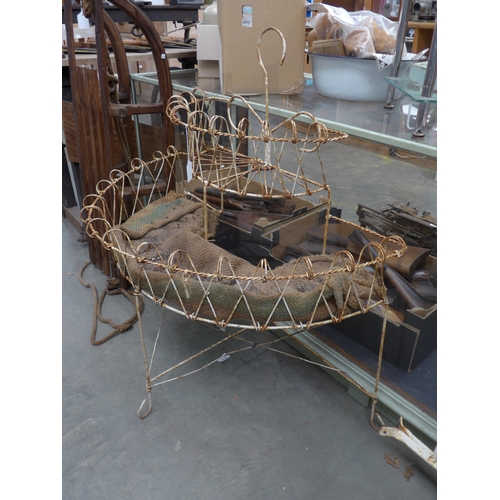 2053 - A painted wire work two tier plant stand