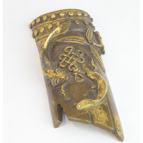 7006 - A Chinese bronze scroll weight decorated with two Buddhist symbols, the endless knot, two golden fis... 