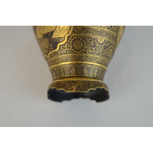 7004 - A miniature Japanese shakudo and gold metal vase, signed

 7cm high x 4.5cm at widest point

 Proven... 