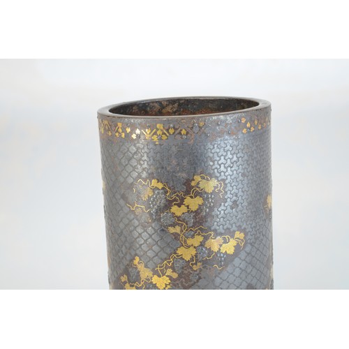 7005 - A Japanese bronze and mixed metal cylindrical vase decorated with fruiting grape vines in gold and s... 