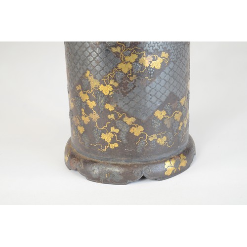 7005 - A Japanese bronze and mixed metal cylindrical vase decorated with fruiting grape vines in gold and s... 