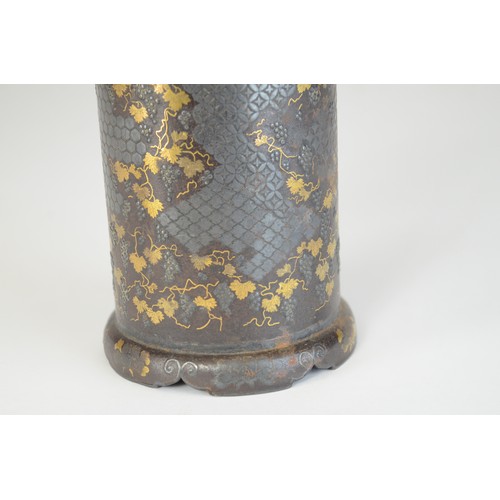 7005 - A Japanese bronze and mixed metal cylindrical vase decorated with fruiting grape vines in gold and s... 