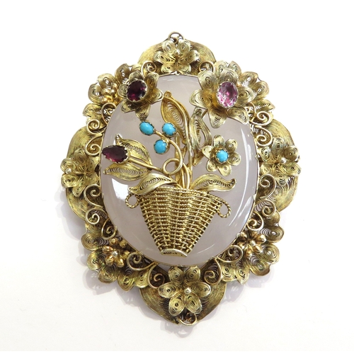 A large gilt filigree brooch, ornate floral frame with basket of ...