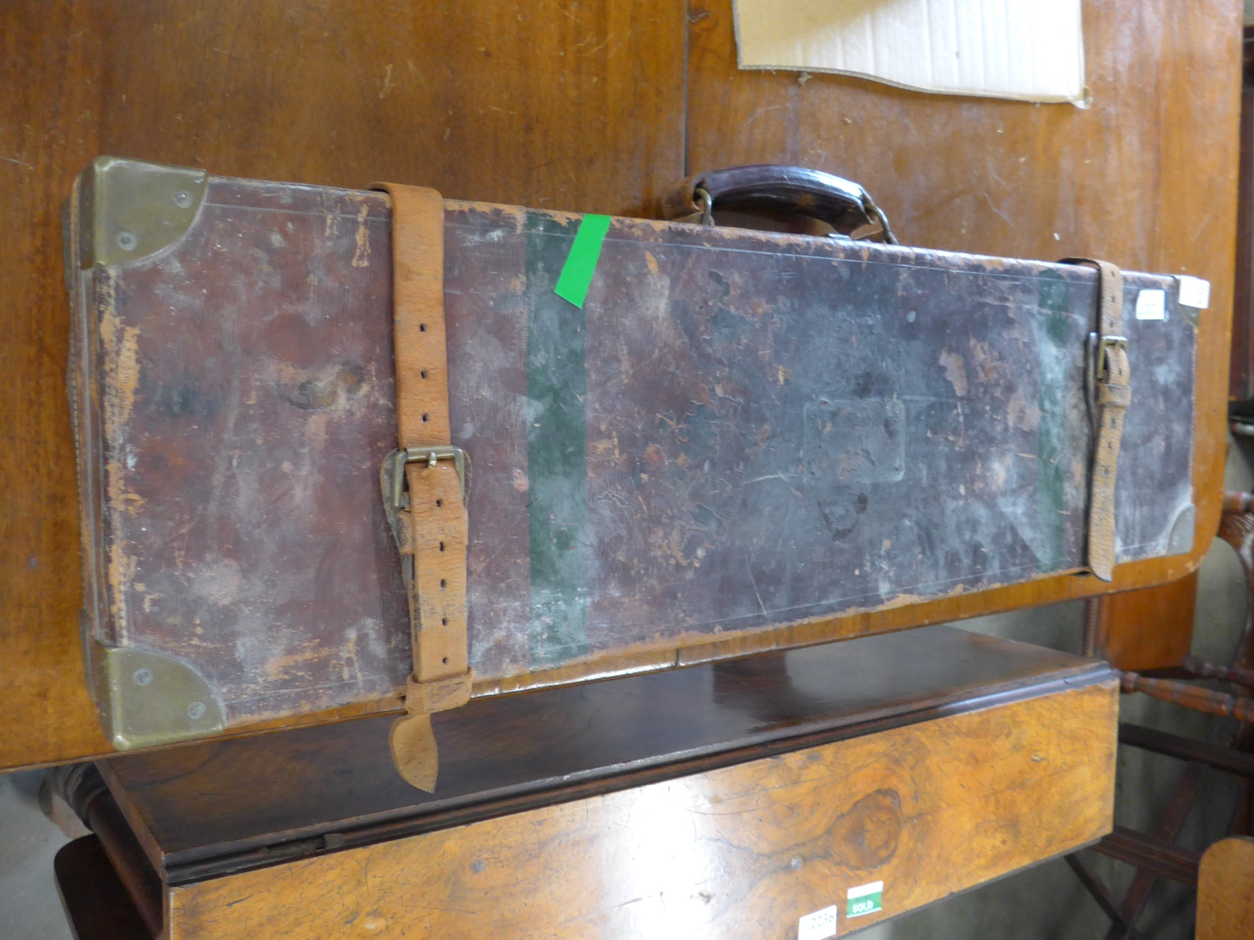 A Victorian leather shotgun case of rectangular form. With cleaning rod ...