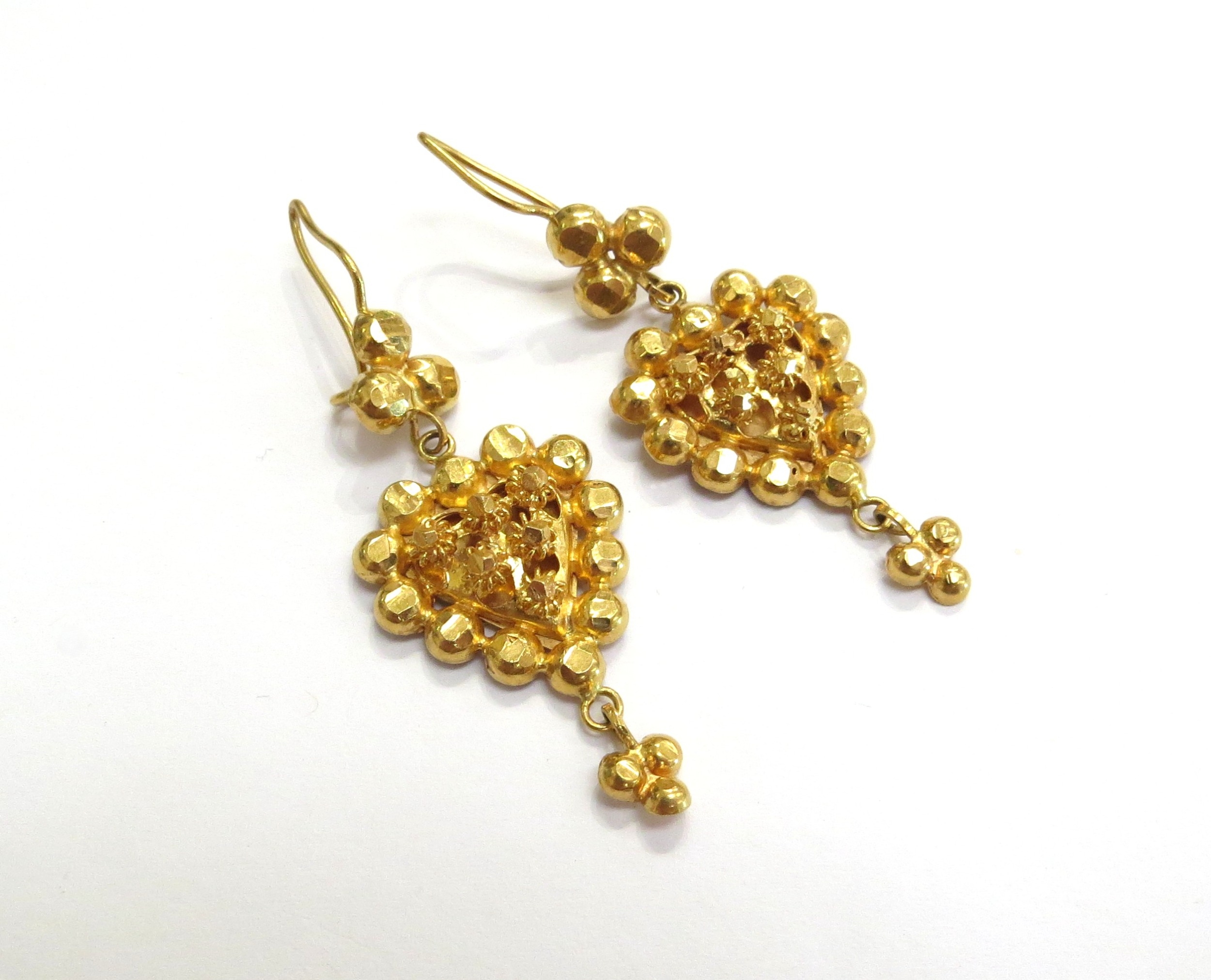 A pair of gold heart shaped drop earrings, 4.3cm long, 9g