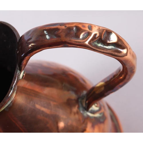 108 - A copper flagon and an oval copper biscuit box