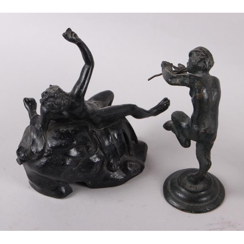 121 - A grand tour white metal souvenir, a figure of Pan and two other figures, 4 1/2