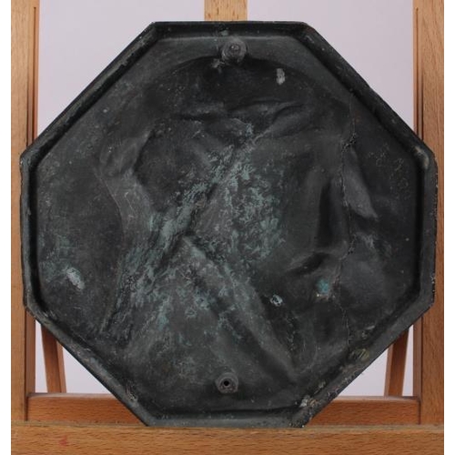 133 - An Art Deco octagonal bronze relief cast bust of Christ, 9 1/2