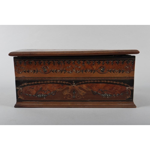 143 - A Continental walnut, ebony and inlaid jewel casket, 10” wide (damages)