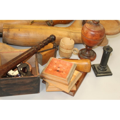 165 - An oak priest, a miniature easel, a wooden urn, shoe lasts and other treen