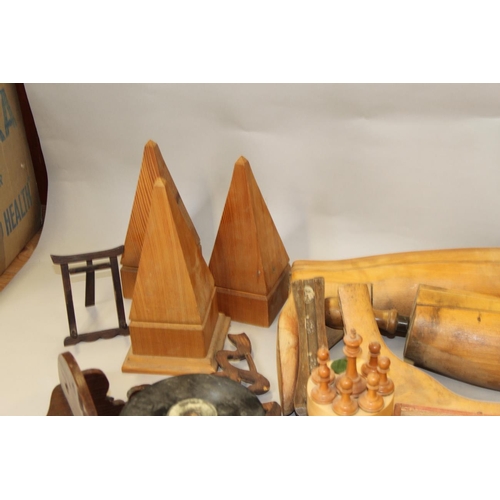 165 - An oak priest, a miniature easel, a wooden urn, shoe lasts and other treen