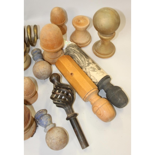 166 - A collection of wooden and other finials, etc