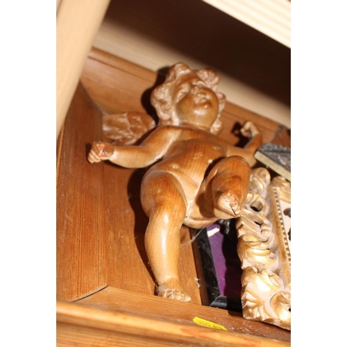 171 - Two carved wooden cherubs, another wooden cherub and three others