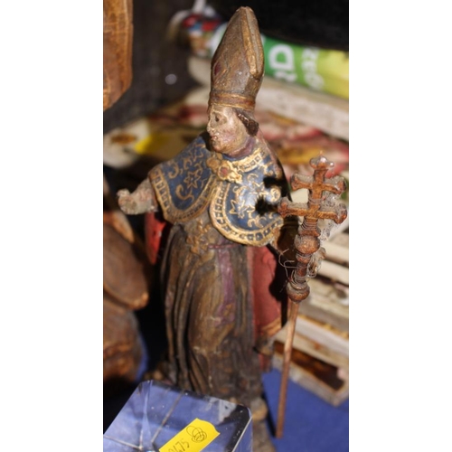 176 - Two Continental carved and painted wood religious figures and a paperweight