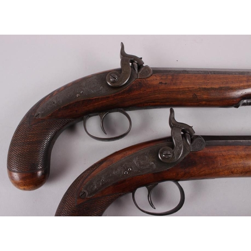 193 - A pair of Westley Richards, Birmingham duelling pistols with octagonal Damascus barrels, 9 1/8