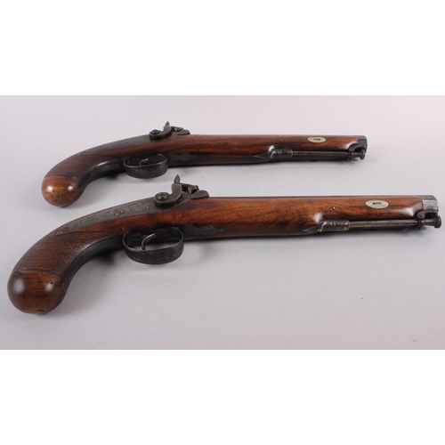 193 - A pair of Westley Richards, Birmingham duelling pistols with octagonal Damascus barrels, 9 1/8