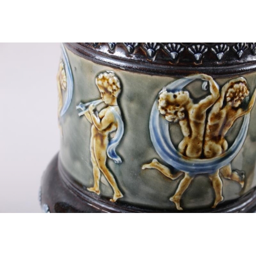 2 - A Doulton Lambeth water filter with relief cherub decoration, 13