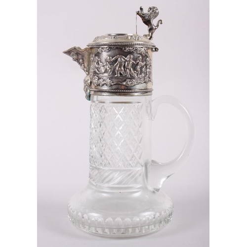 306 - A white metal mounted cut glass claret jug, stamped Topazio, 11