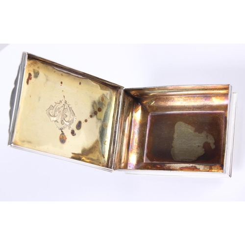 317 - An unmarked white metal snuff box with parcel gilt interior