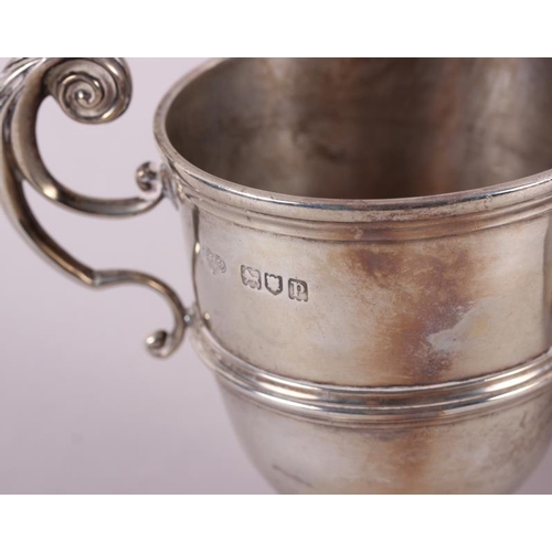 329 - A silver half-pint mug and a silver two-handled trophy cup, 11.4oz troy approx