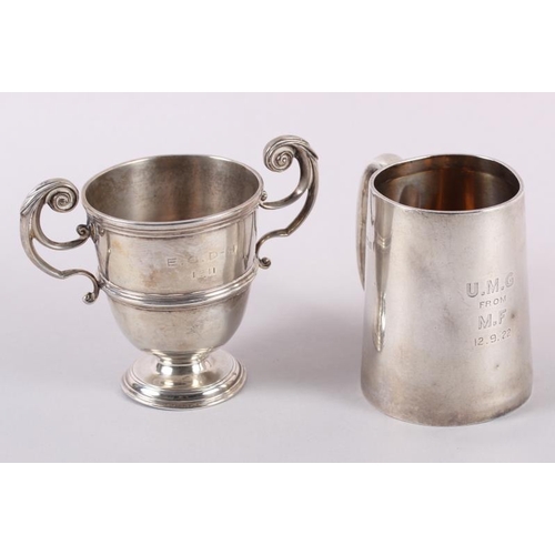 329 - A silver half-pint mug and a silver two-handled trophy cup, 11.4oz troy approx