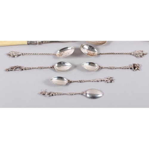 332 - A pair of Victorian silver mustard spoons, a Georgian silver teaspoon, a number of Eastern white met... 