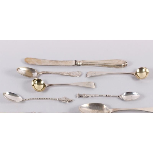 332 - A pair of Victorian silver mustard spoons, a Georgian silver teaspoon, a number of Eastern white met... 