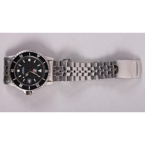 385 - A gentleman's Tag Heuer Professional stainless steel bracelet watch with black dial, baton numerals ... 