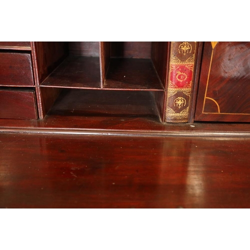 498 - A Georgian mahogany fall front bureau with interior fitted pigeonholes and central cupboard over fou... 