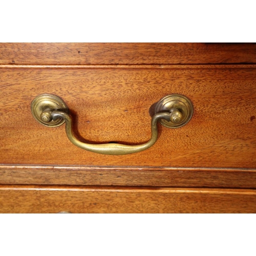 498 - A Georgian mahogany fall front bureau with interior fitted pigeonholes and central cupboard over fou... 