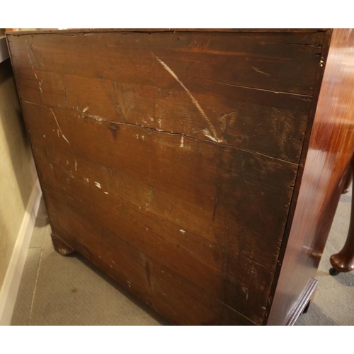 498 - A Georgian mahogany fall front bureau with interior fitted pigeonholes and central cupboard over fou... 