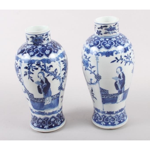 53 - A pair of 19th century Chinese blue and white vases, decorated panels with figures, birds and flora ... 