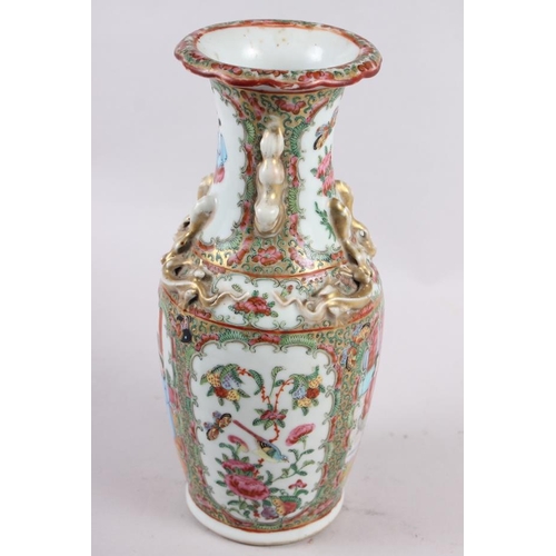 59 - A Canton enamel two-handled baluster vase with gilt decoration, 9 1/2