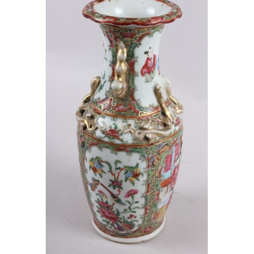 59 - A Canton enamel two-handled baluster vase with gilt decoration, 9 1/2